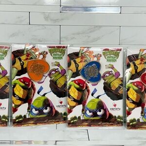4 Limited edition Teenage Mutant Ninja Turtles Mayhem Varsity charity heart set